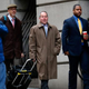 William Porter (right), one of six Baltimore police officers charged in connection with the death of Freddie Gray earlier this year, walks to a courthouse with his attorney Joseph Murtha (second from right) in Baltimore Nov. 30, 2015, for jury selection in his trial.
Rob Carr/Getty Images